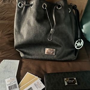 Authentic Michael Kors drawstring handbag and matching wallet